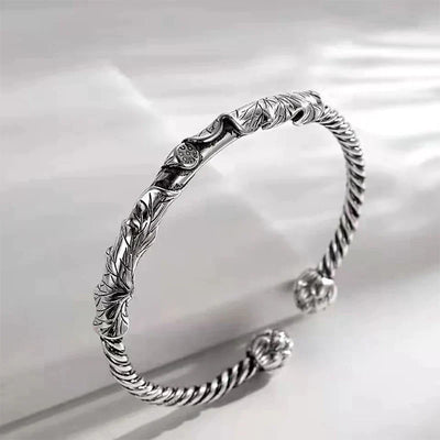 Aurelius - Handmade open bangle with lotus detail