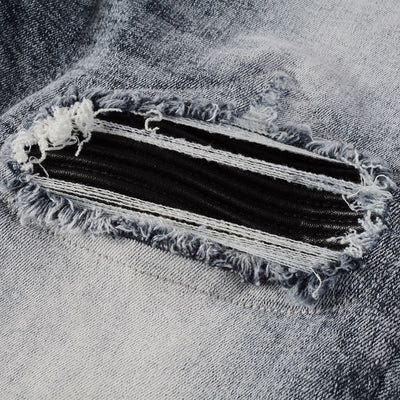 Jeans ajustados desgastados Blackout