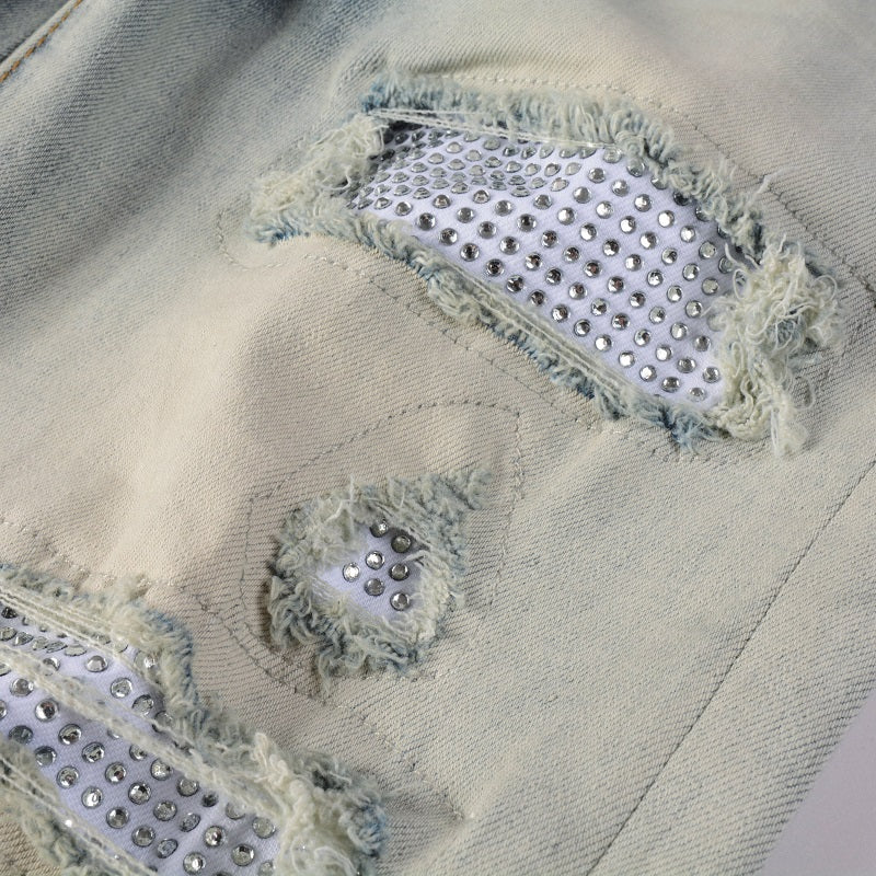 Vaqueros desgastados con borde esmerilado